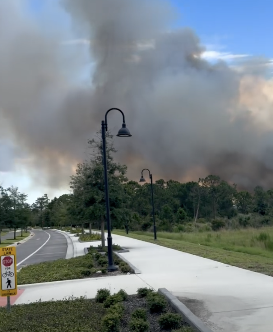 Martin County brush fire contained after burning 105 acres near Palm City neighborhood